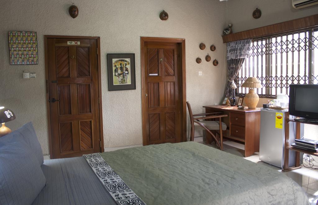 Four Villages Inn Kumasi Szoba fotó